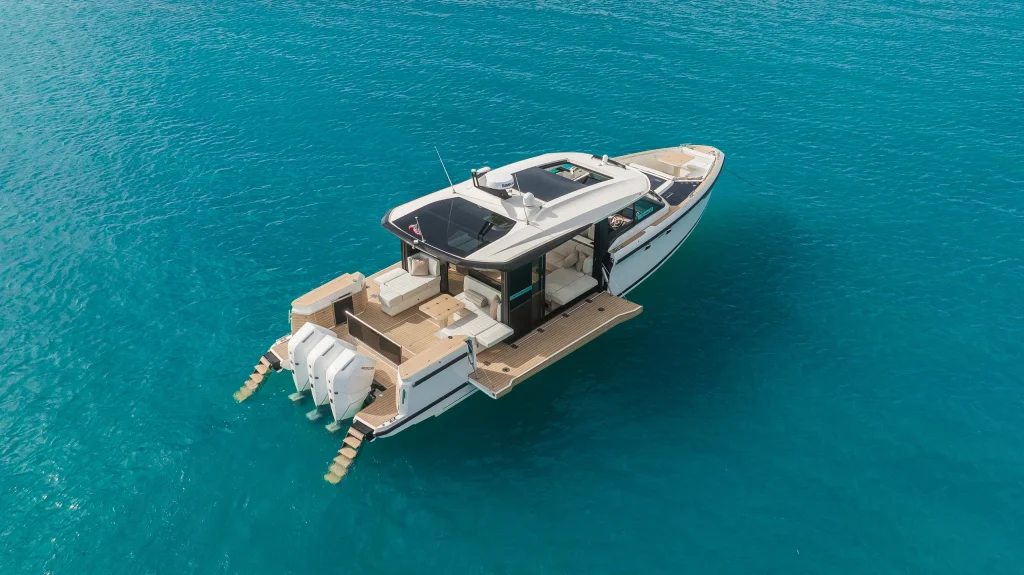 Saxdor 460 GTC at anchor with both terraces open, aerial view